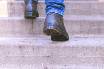 Man climbs the concrete stairs