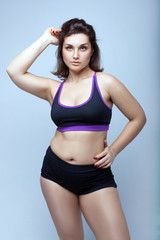 Plump girl in sportswear.