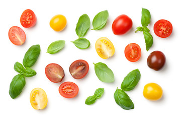Tomatoes and Basil Leaves Isolated on White Background