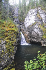 Virgin Komi forests, a waterfall in the rocks.