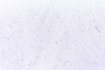 Violet mullberry paper textured background, detail close-up