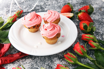 Delicious cupcake for Valentine Day. cake for Valentines day with chocolate and strawberries. Traditional homemade with red roses