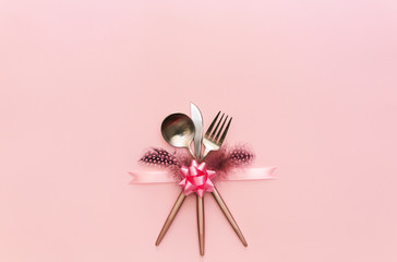 Fork, knife, spoon, silverware with on pink background for catering, menu, email, banner, restaurant party celebration