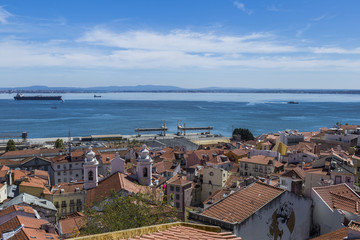 Fototapeta na wymiar High point of view of river Tejo from Alfama, Lisbon, Portugal