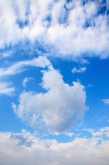 Naklejka na ściany i meble clouds against the blue sky