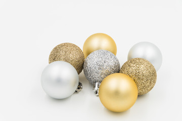 Pile of silver and gold xmas balls