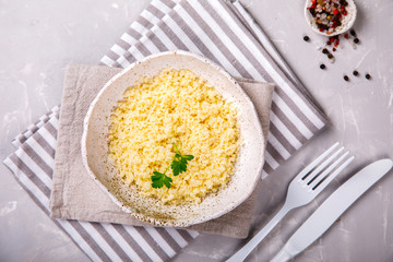 Couscous with parsley in the bowl..Concept of Healthy Food.Food or Healthy diet concept.Super Food.Vegetarian.Copy space for Text.