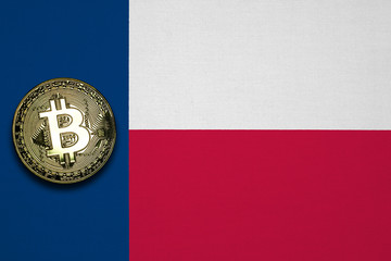 Gold Bitcoin with Texas, USA flag in the background