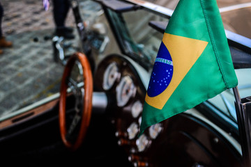 Brazil flag in an old car