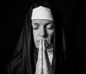 praying hands in black and white