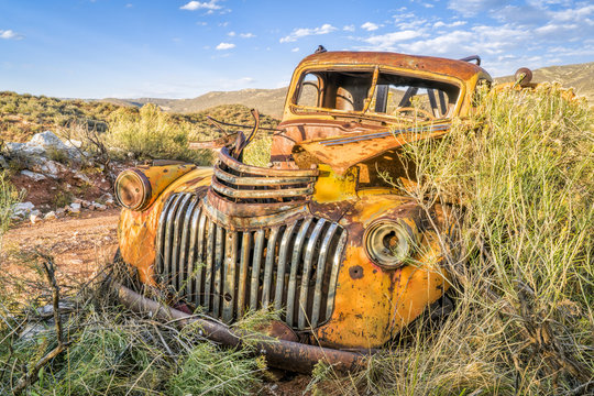 old rusty towing truck at Colorado foothills