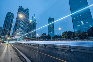 Fototapeta premium urban city road with motion bus at twilight, china.