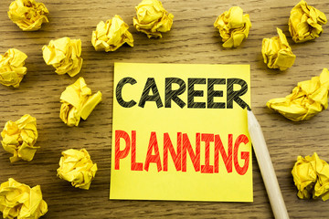 Fototapeta premium Word, writing Career Planning. Business concept for Business Growth Goal Setting written on sticky note paper on the wooden background. Folded yellow papers on the background
