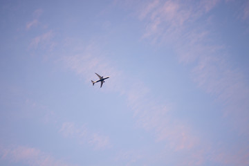 Airplane under Pink and Blue Sky