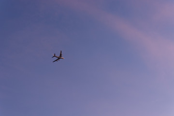 Airplane under Pink and Blue Sky