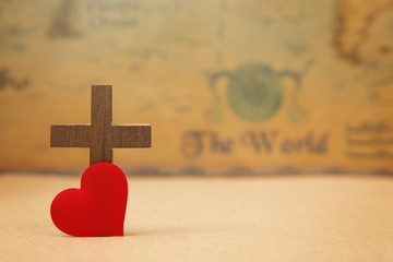 For God so loved the world - A Cross on a rustic world map