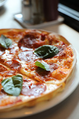 Hot Pepperoni Pizza in dish , Italian food
