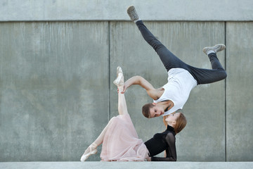 Couple dancing on city street