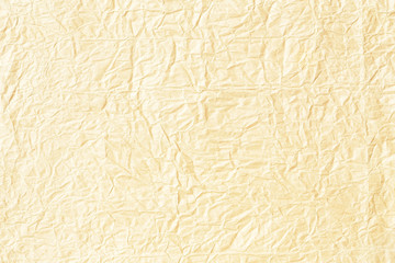 Crumpled yellow background paper texture