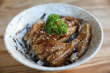 japanese food , Chicken teriyaki with rice on wood background