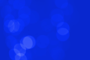 Blue and white backgrounds are blurred to enter text and images.