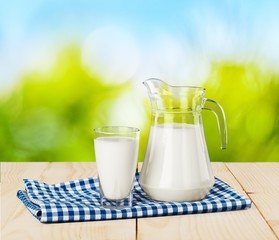 Glass of milk and jug