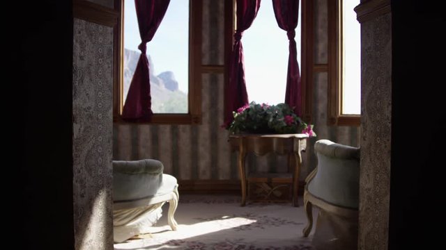 Old west town bordello tilt down interior waiting room