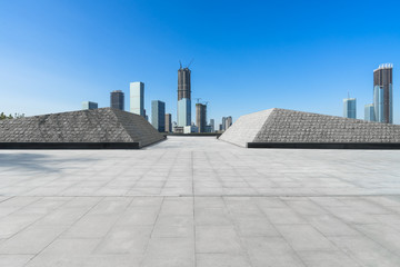 Fototapeta premium Panoramic skyline and buildings with empty square floor.