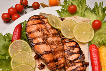 Grilled trout with fresh Greens