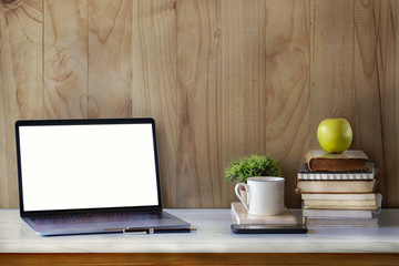 Mock up Laptop, stylish workspace creative supplies with blank screen laptop on marble desk.