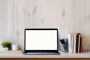 Mock up Laptop, stylish workspace creative supplies with blank screen laptop on marble desk.