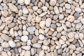 Stone pebbles texture or stone pebbles background. stone pebbles for interior exterior decoration and industrial construction concept design. stone pebbles motifs that occurs natural.