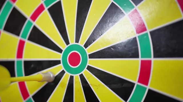 closeup of arrow in magnetic darts game
