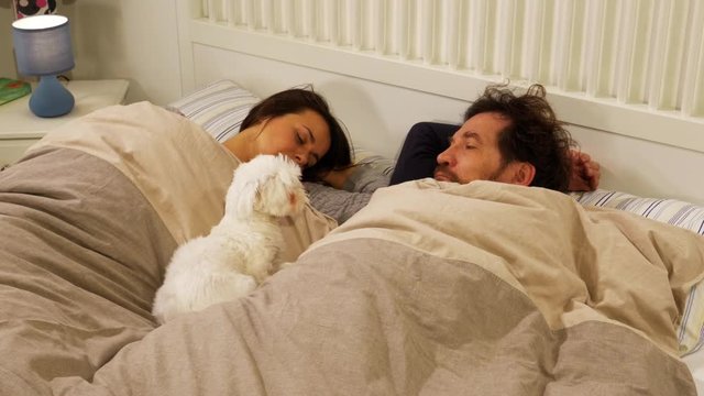 Husband not able to sleep wife snoring at night in bed slow motion