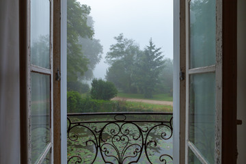 Foggy morning country window open 