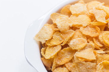  image  Close up Cornflakes cereal breakfast in white bowl on white background.