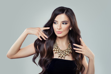 Fototapeta premium Pretty Young Woman with Beautiful Healthy Hair