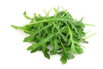 Heap of Green fresh rucola or arugula leaf isolated on white background