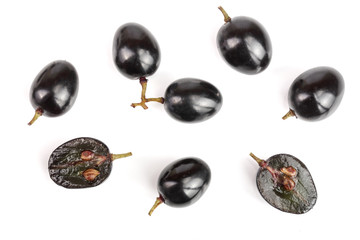Dark grapes isolated on white background, top view. Flat lay