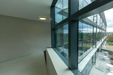 Office interior of glass and steel building