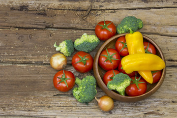 fresh vegetables on wooden background