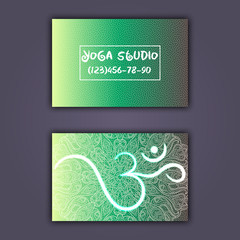 Business card for yoga studio or yoga instructor. Ethnic background with mandala ornament and ohm
