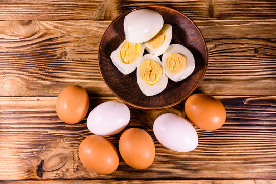 Boiled eggs on the old wooden table