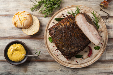Baked whole pork bacon.