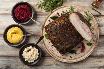 Baked whole pork bacon.