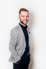 Happy grey suit guy on white background