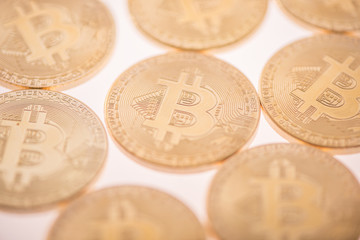 gold bitcoin coins on white background 