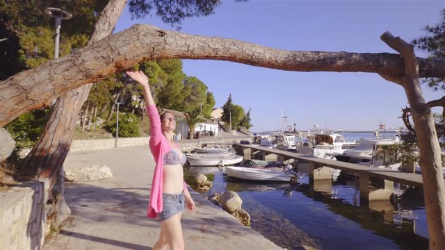 Visiting tree leaning over marine in Mandre 4K