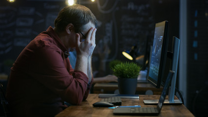 Stressed Financier Hits the Table with His Fist in Frustration and Covers His Face in Hands. He's...