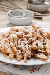 Angel wings biscuits, a traditional European sweet dish for carnival. Rustic style.